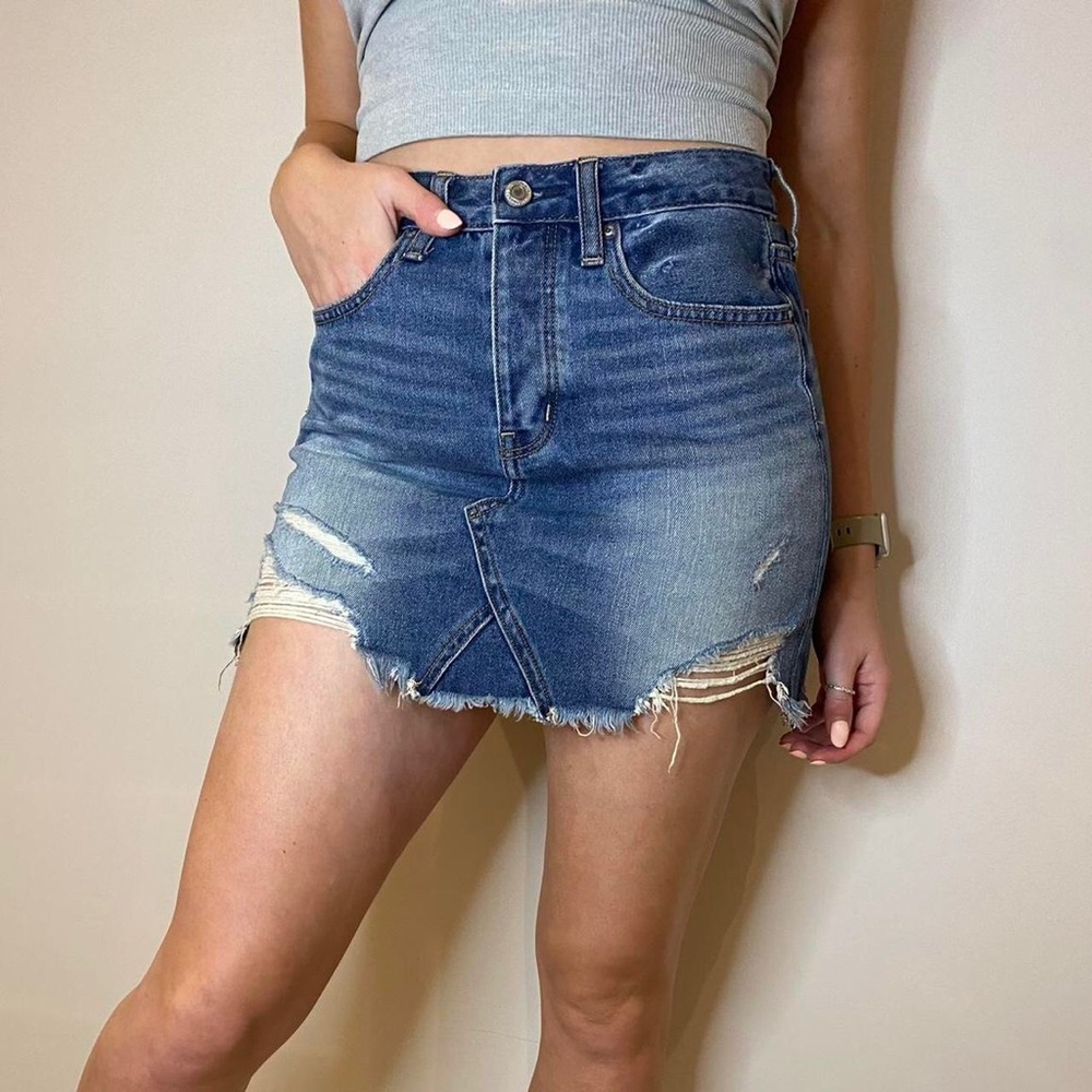 Denim high waisted mini skirt  A cowboy in trouble  The small size